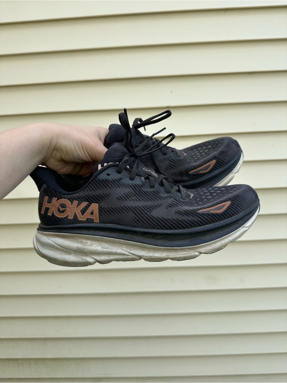 HOKA Women’s Black Running Shoes with Bronze Accents 10B
